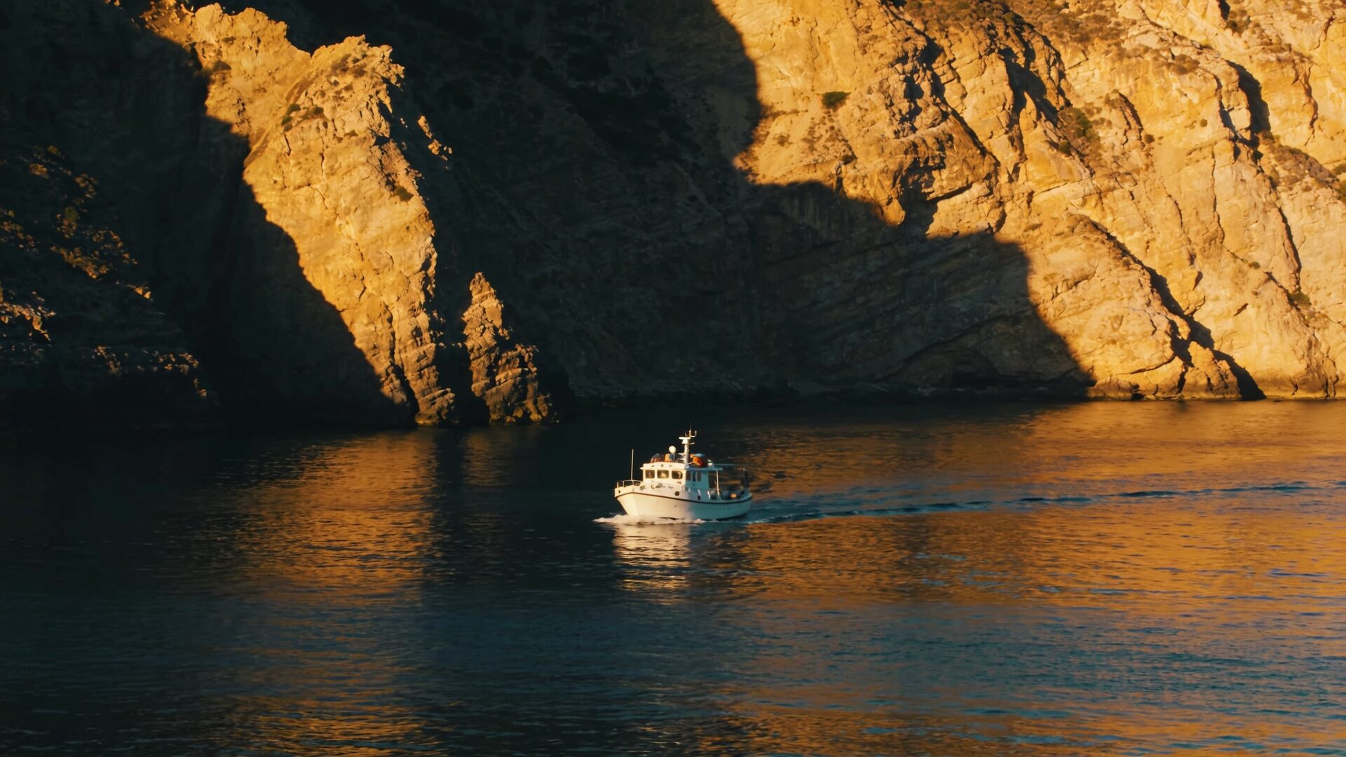 Coastal cliffs at golden hour near the property